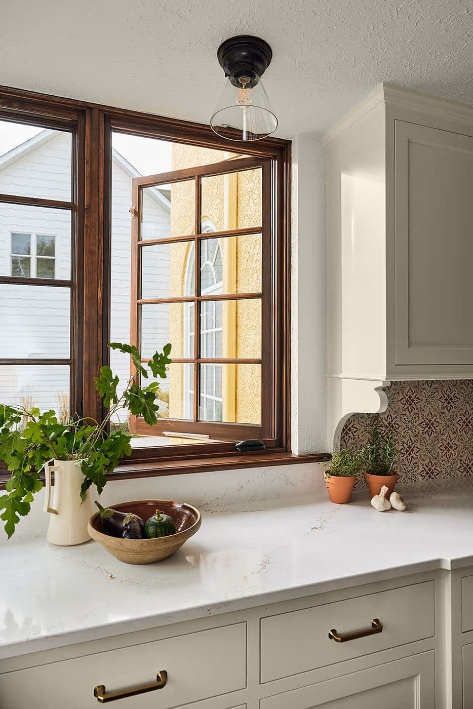 Kitchen of home with Marvin Signature Ultimate Wood Casement Window.